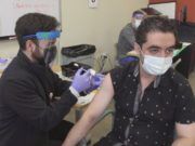 Herd immunity unlikely until children are vaccinated, doctor says