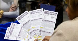 Lawsuit seeks to require Wisconsin clerks to let voters fix problems with their absentee ballots
