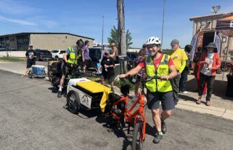 “Pedaling with a purpose.” Meals on 2 Wheels celebrates launch of e-bike grocery delivery service