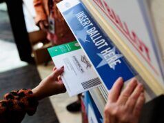 Judge pauses US Postal Service plan to implement Trump’s new mail voting restrictions