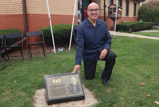 Omega School honors longtime director Oscar Mireles with plaque